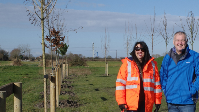 Estelle Slater and Tim Moxey by 2000th tree planted on Hinkley Connection Project
