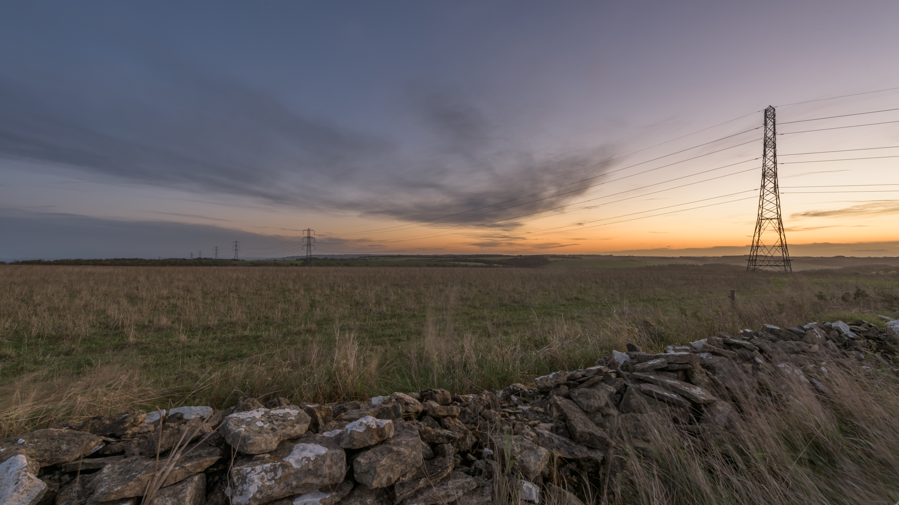 Electricity pylon in field