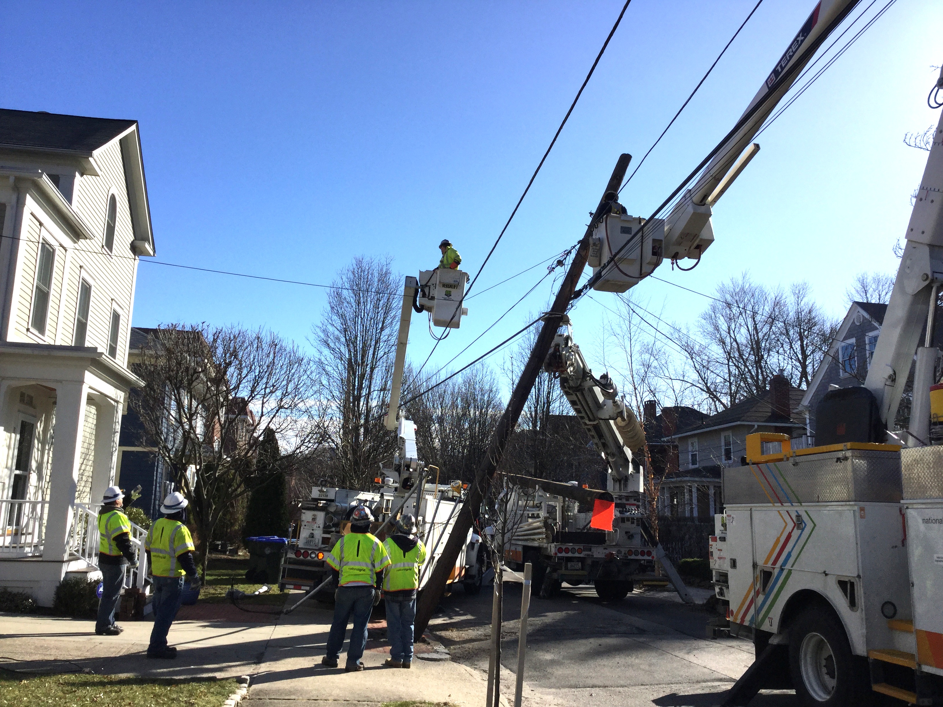 National Grid operatives restore a pole taken down in Storm Riley