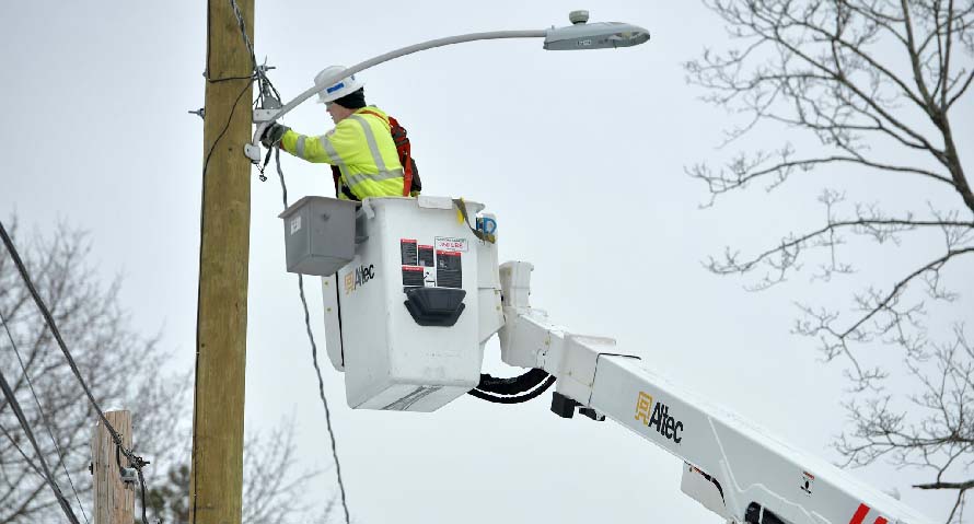 A man near a pole
