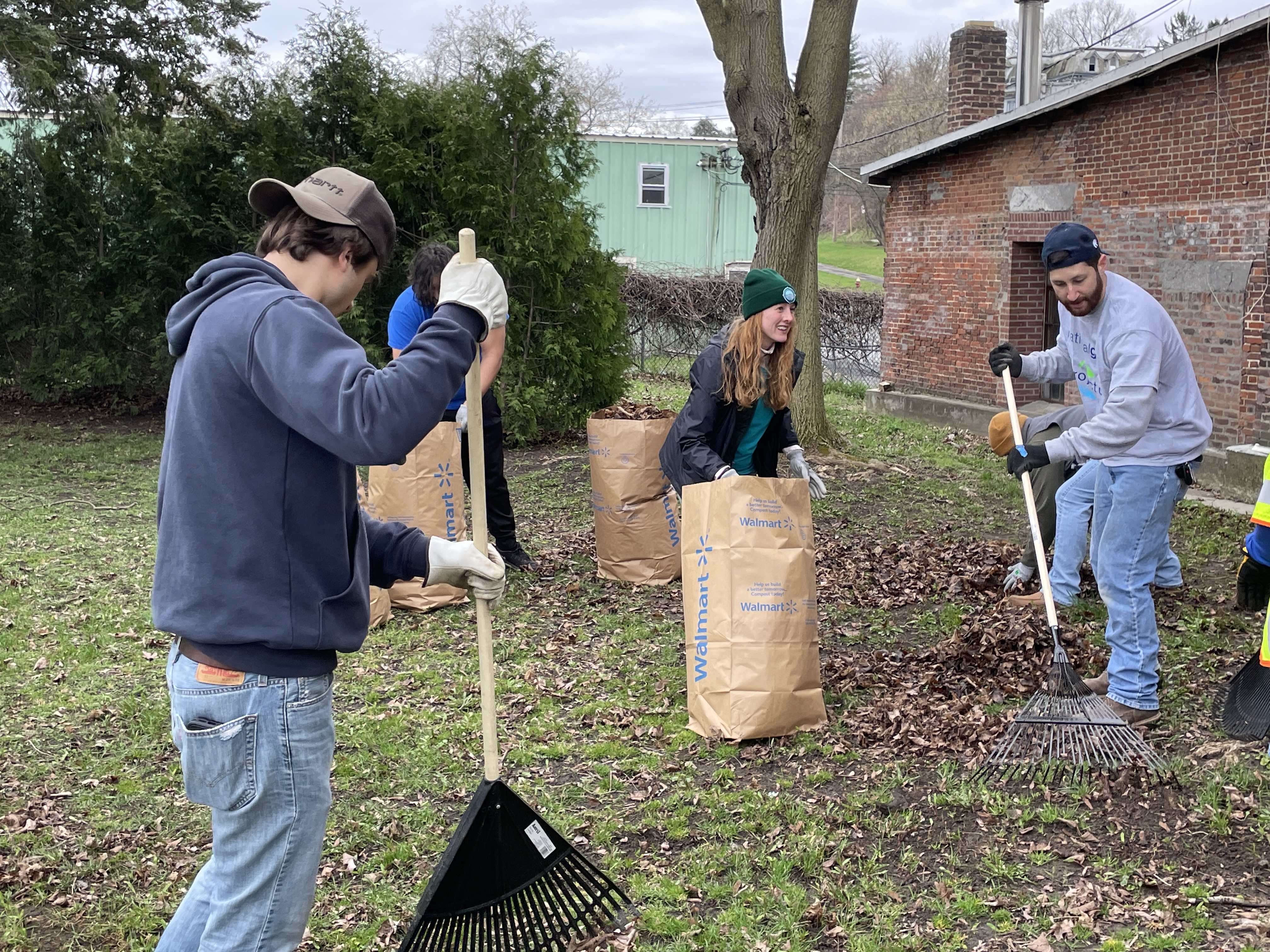 Earth Day volunteers Cleaning Yard