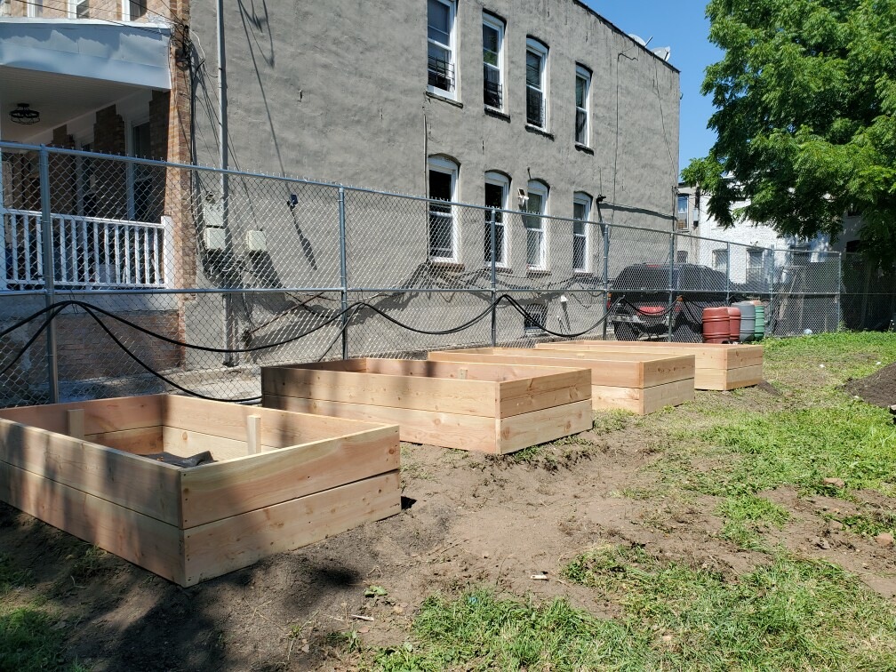 Community garden with raised planting beds