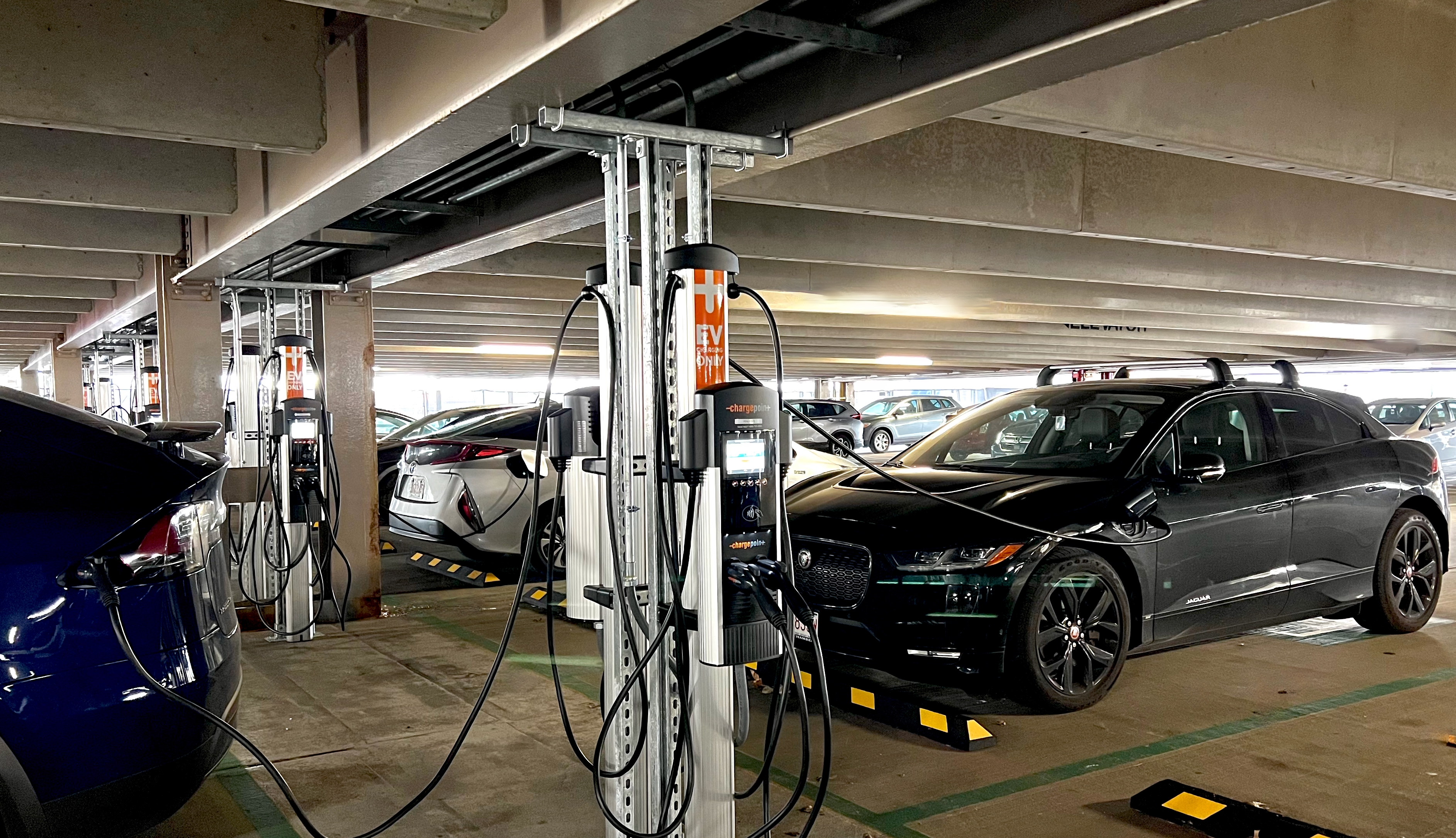Electric vehicle (EV) charging ports