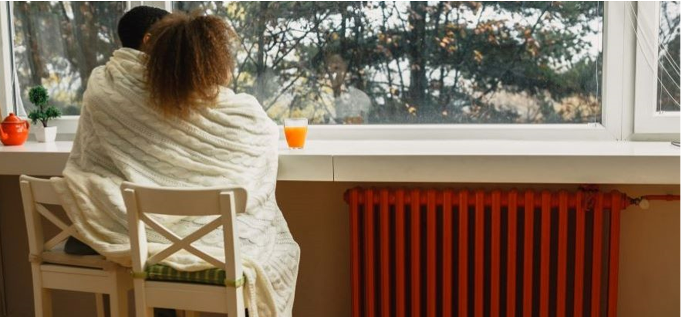 Sitting near home radiator heater