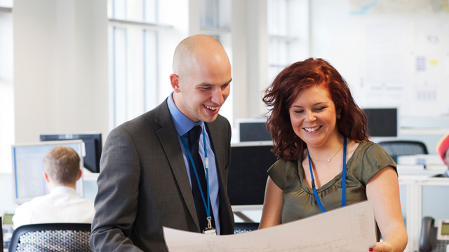 Man and woman working together in an office environment