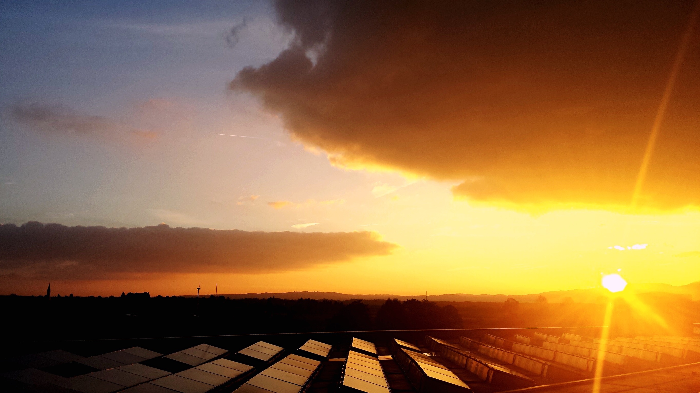 Sunset over solar panels for ESO article