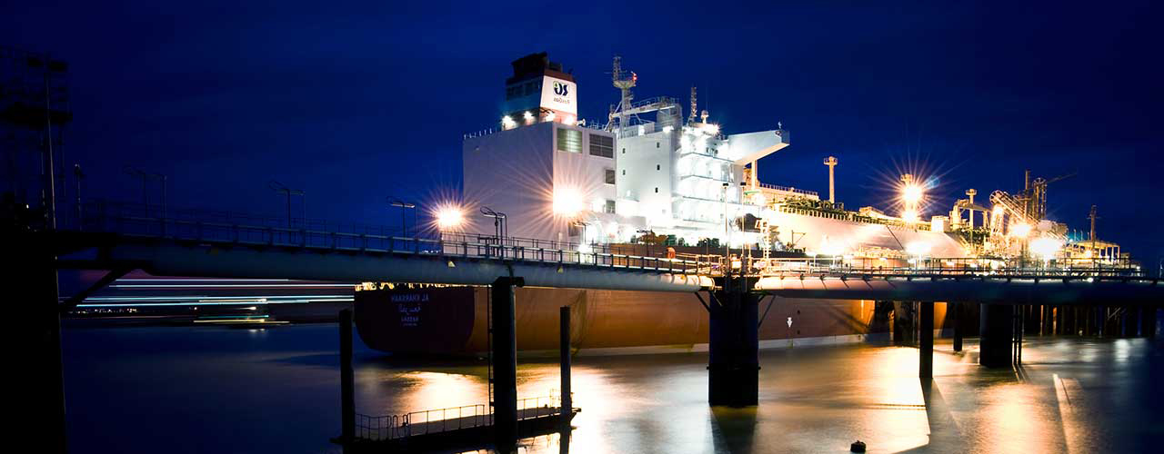 Ship docked at night at Grain LNG in Kent - used for the National Grid story 'Helping to fuel the nation'