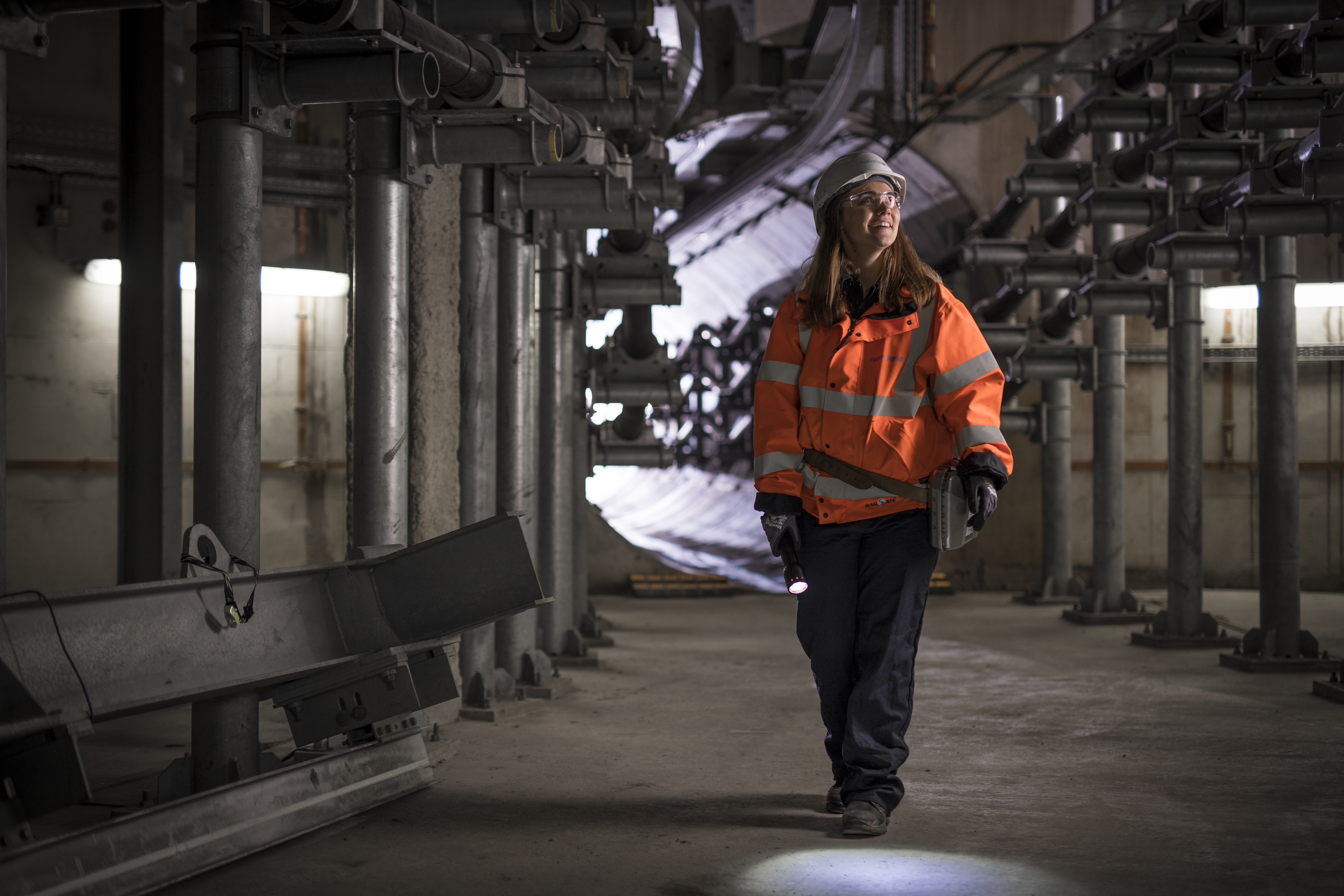 Female grad working in London Power Tunnels