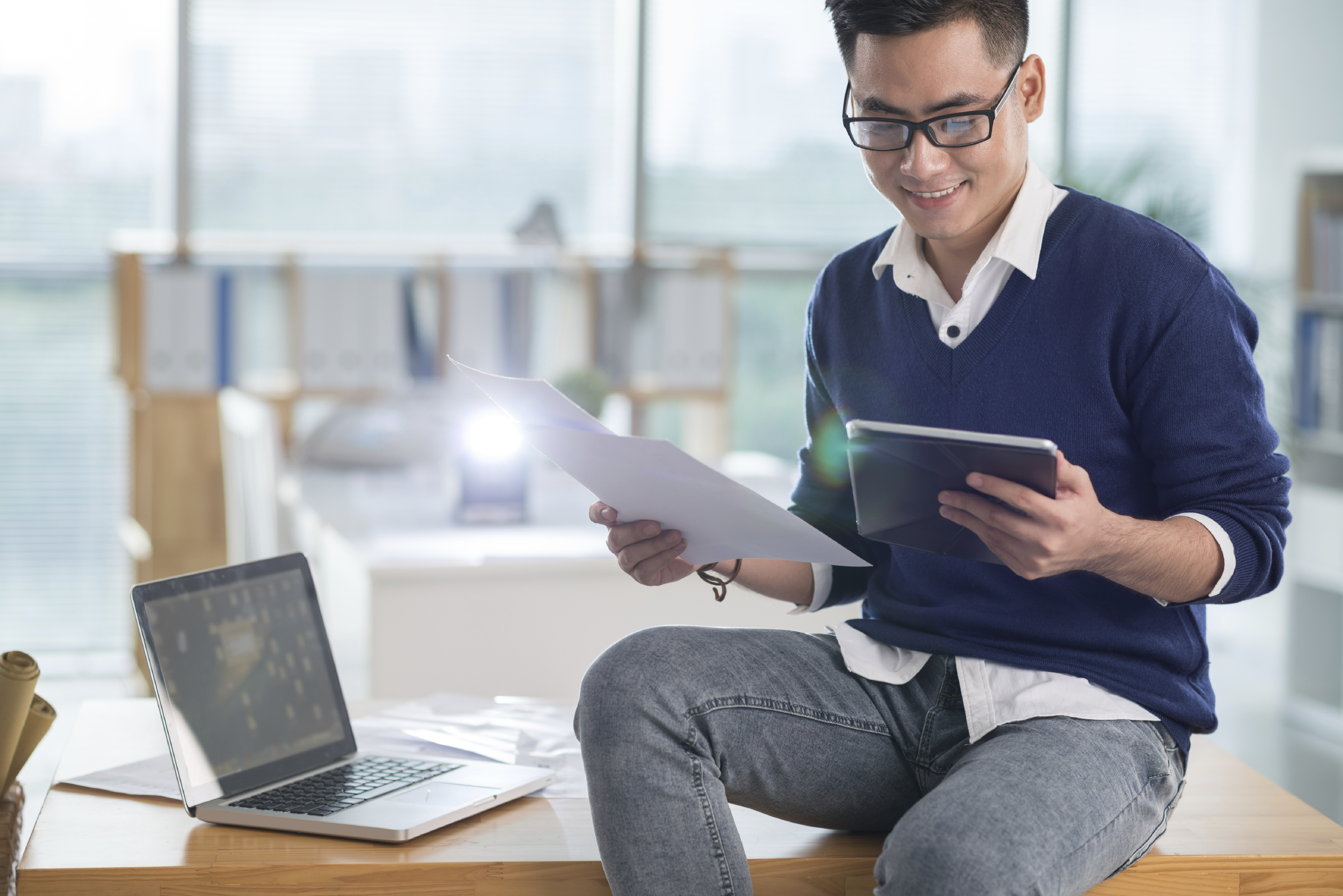 Man reading news on iPad