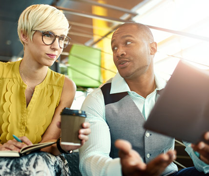 Man and woman in a meeting