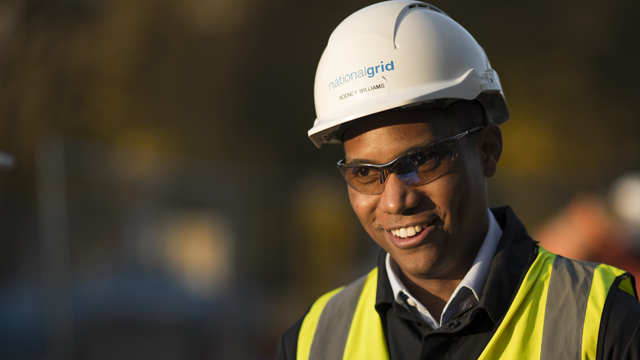 National Grid's Rodney Williams wearing hard hat and high vis vest