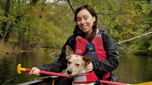 Photo of National Grid US's Sarah Basham and her dog for Green Collar Jobs story