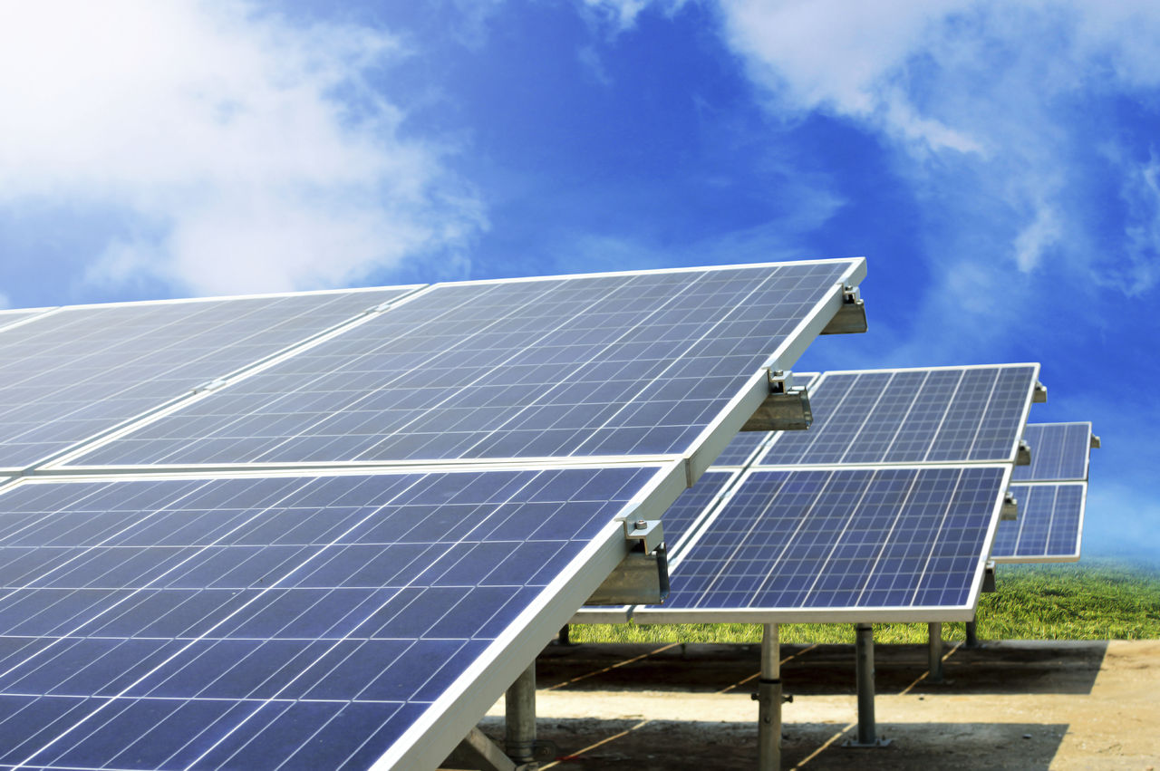 Solar panels in a solar farm under a blue sky - used for the National Grid story 'South Dakota solar energy project set to generate 128MW of green power'