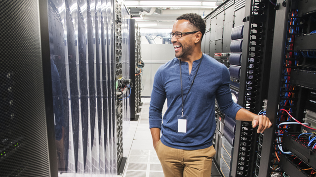 Technician in server room for NGP 'Exciting new investments in AI' story
