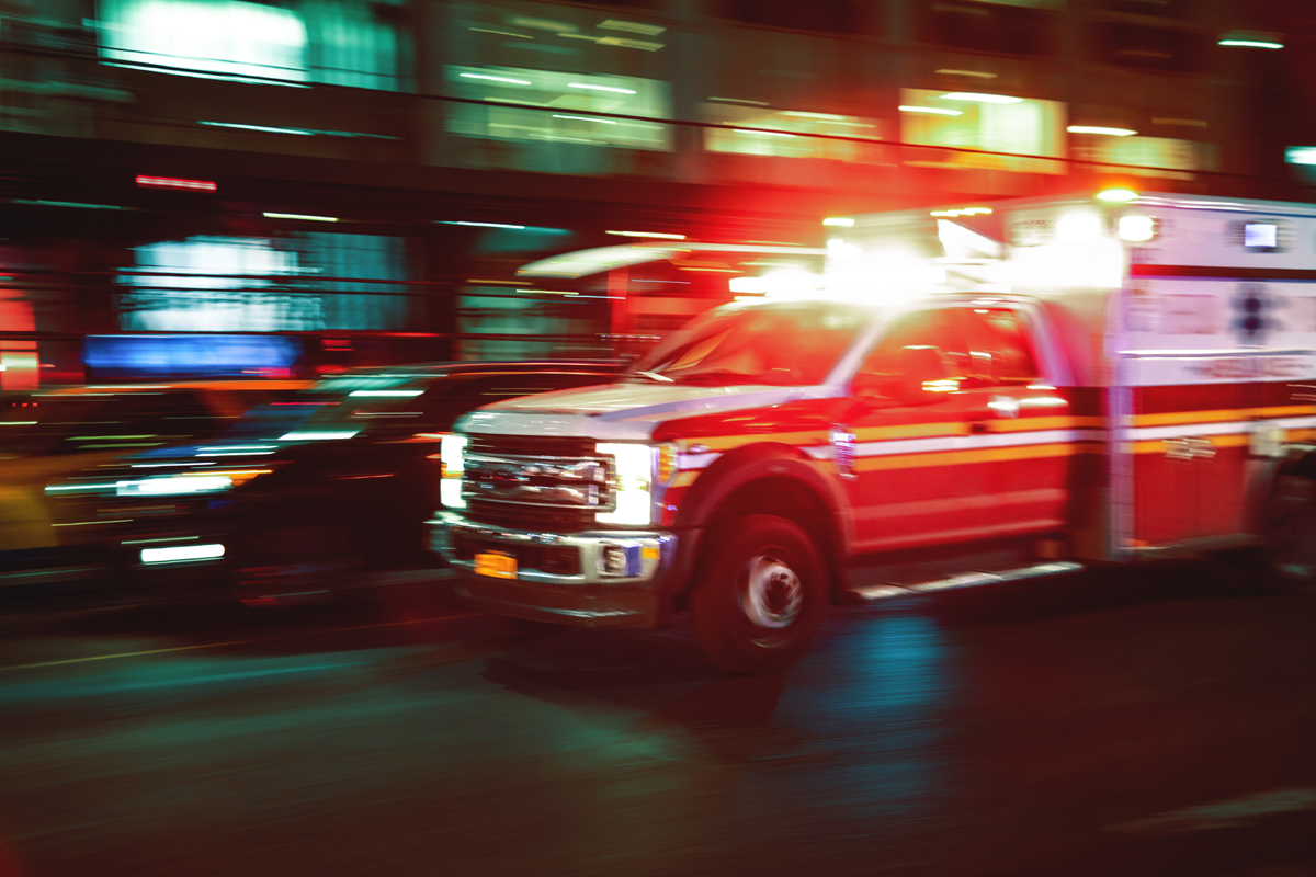 Blurred image of a US ambulance in motion - used for the National Grid story 'Powering healthcare in New York'