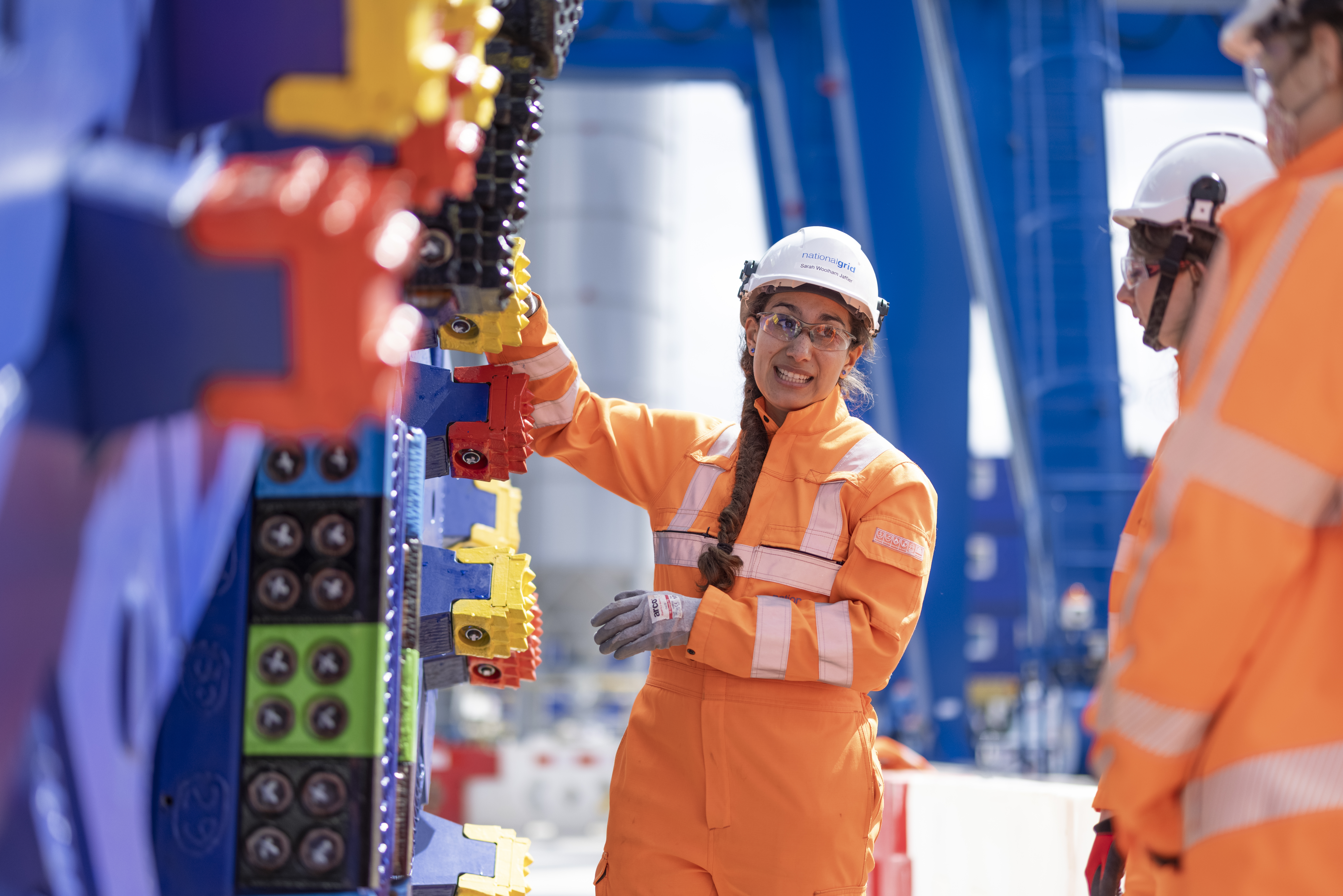 Woman Engineer on site wearing personal protective clothing