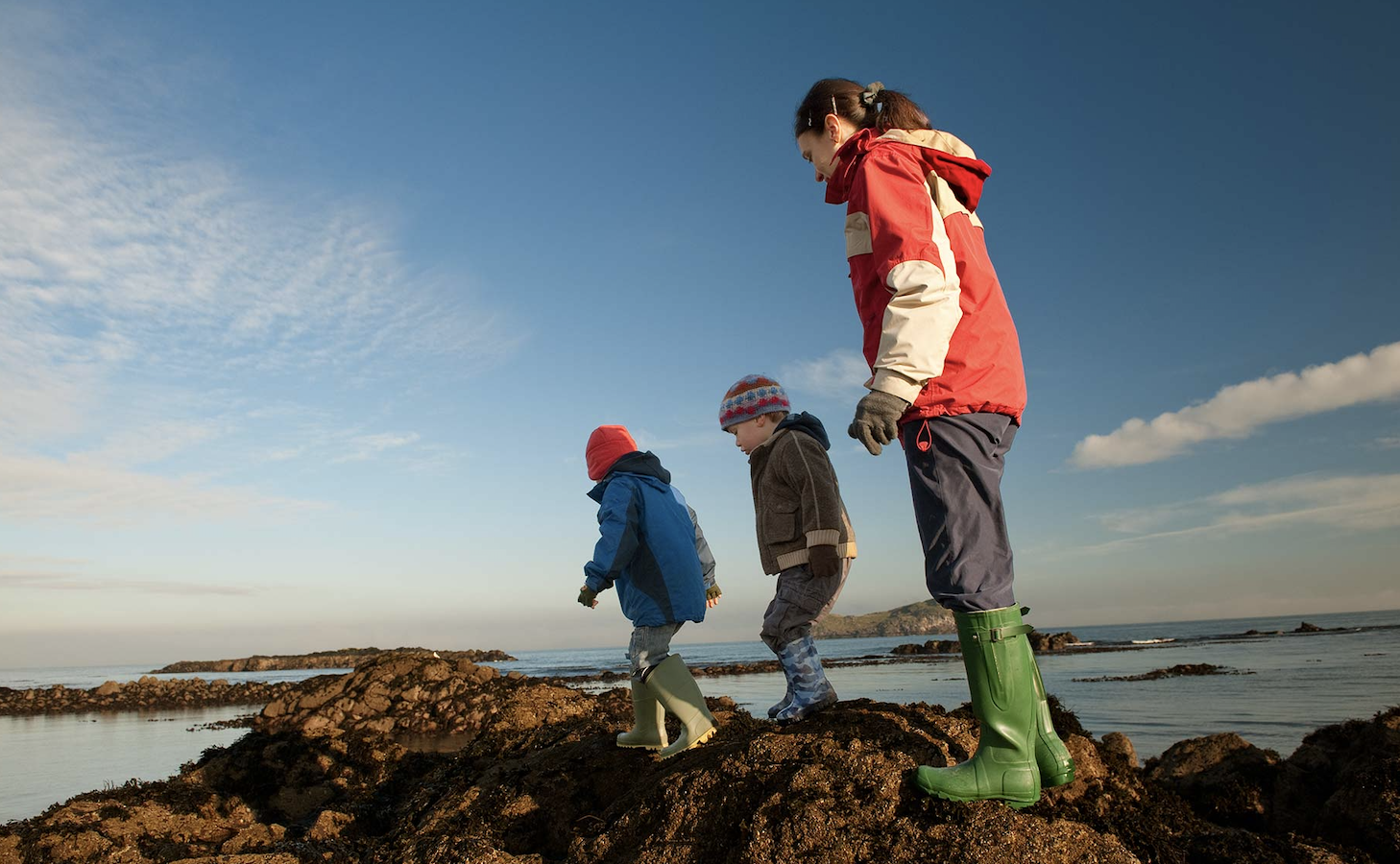 Kids playing on some rocks