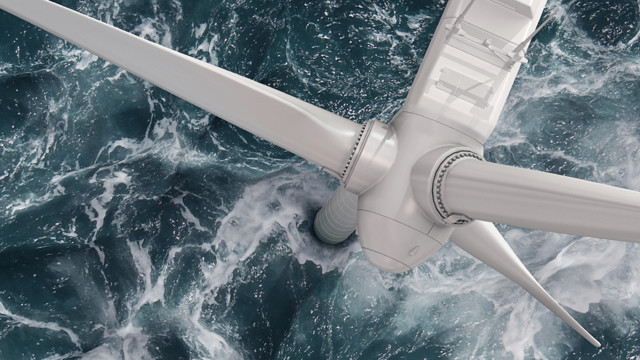 Wind turbine in choppy sea seen from above