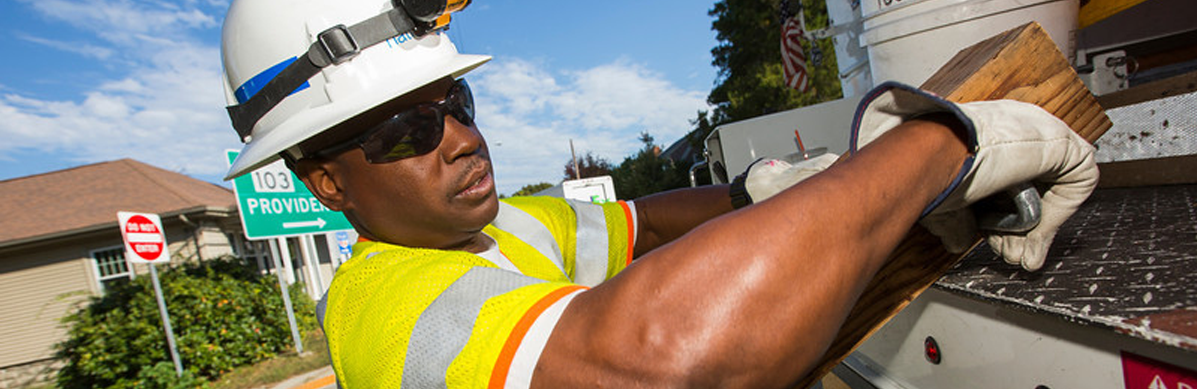 National Grid worker removing equipment from a truck- Our values