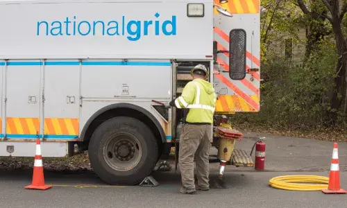 National Grid truck and employee