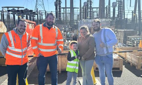 Ted with his parents and National Grid team members