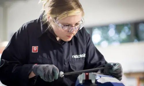 Apprentice engineer at work
