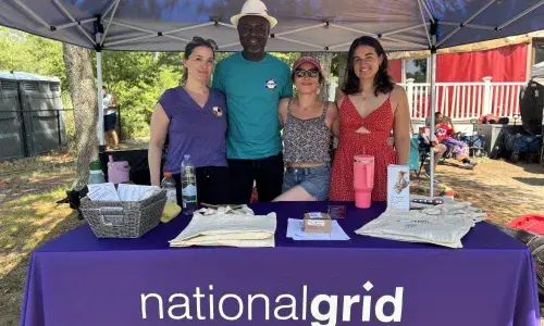 National Grid staff at the Mashpee Powwow with the Tribal Historical Preservation intern