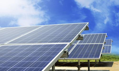 Solar panels in a solar farm under a blue sky - used for the National Grid story 'South Dakota solar energy project set to generate 128MW of green power'