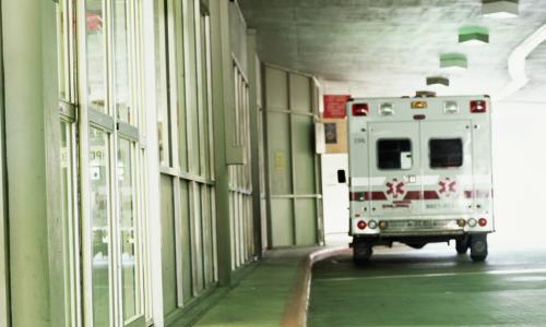 Back of a US ambulance parked outside sliding doors - used for the National Grid story 'Lending a helping hand during the COVID-19 crisis'