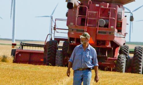 Photo of windfarm and tractor