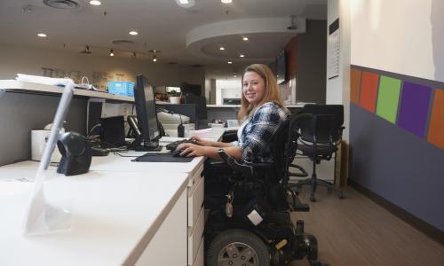 Young woman in wheelchair for National Grid article on disability