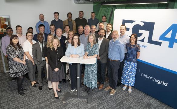 signing group photo