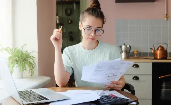 Woman Looking at her Bill
