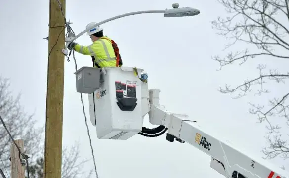 A man near a pole