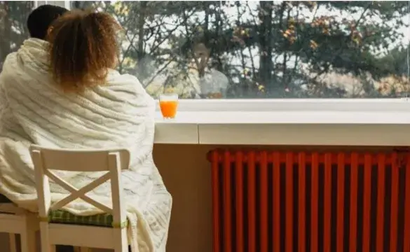Sitting near home radiator heater