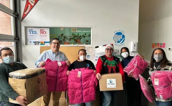 Donating 900 winter coats and 100 pairs of winter gloves
