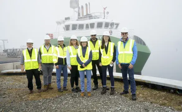 Crew members in safety gear