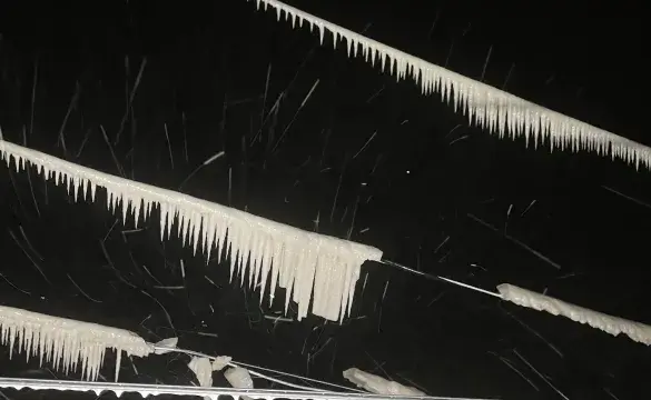 Snow covered power line