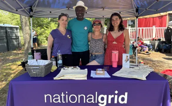 National Grid staff at the Mashpee Powwow with the Tribal Historical Preservation intern