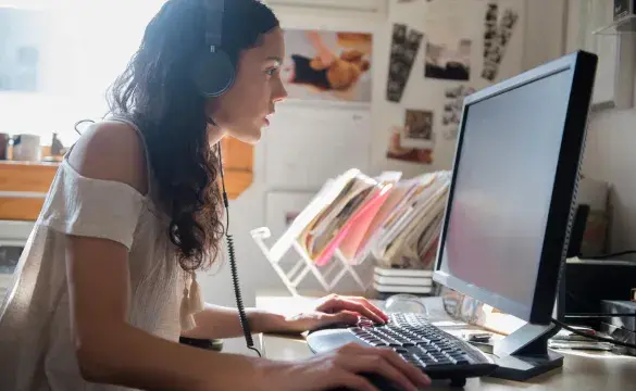 Woman at a computer.