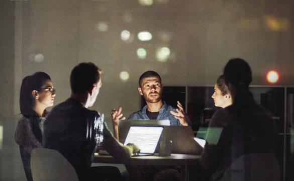 Creative employees working late at the office