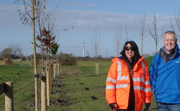 Estelle Slater and Tim Moxey by 2000th tree planted on Hinkley Connection Project