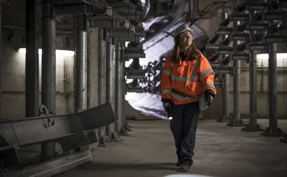 Female grad working in London Power Tunnels