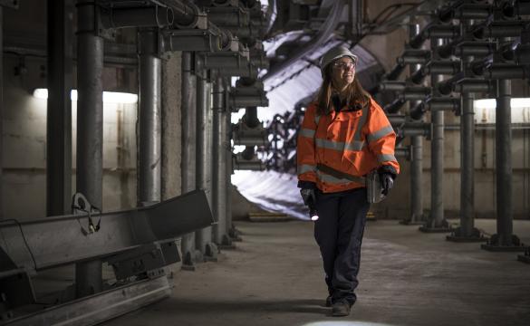 Female grad working in London Power Tunnels