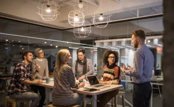 Man discussing new ideas with the team