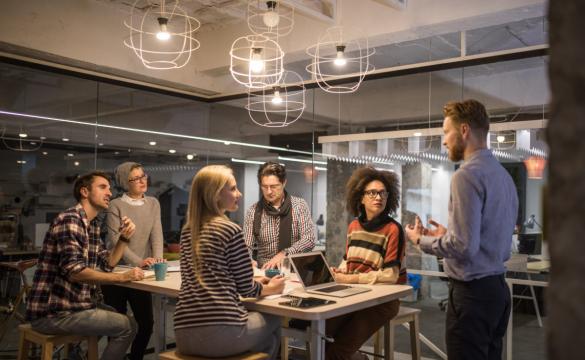 Man discussing new ideas with the team