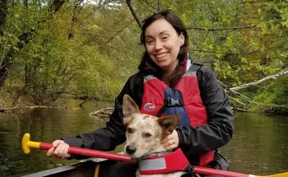 Photo of National Grid US's Sarah Basham and her dog for Green Collar Jobs story