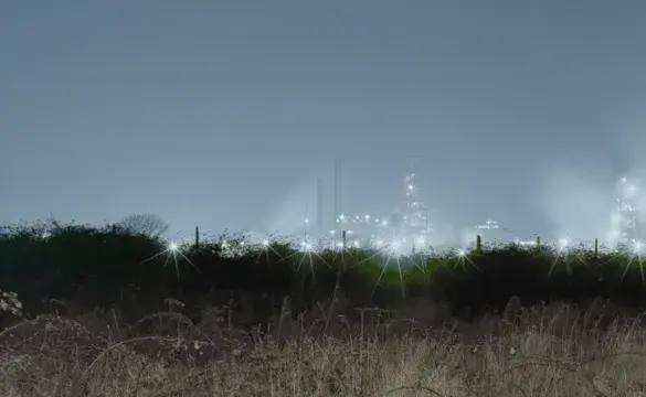 Lights from Steelworks in the distance at night
