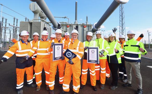 Viking Link team members holding the Guinness World Record certificates and plaque