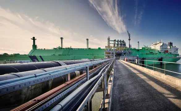 Ship docked at the end of the jetty at the Grain LNG terminal in Kent